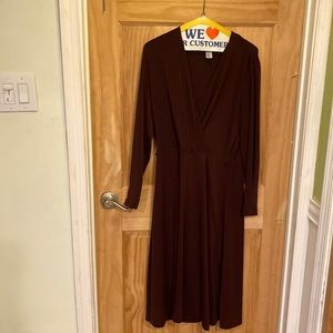 Faux wrap dress. Long sleeves. 100% polyester.